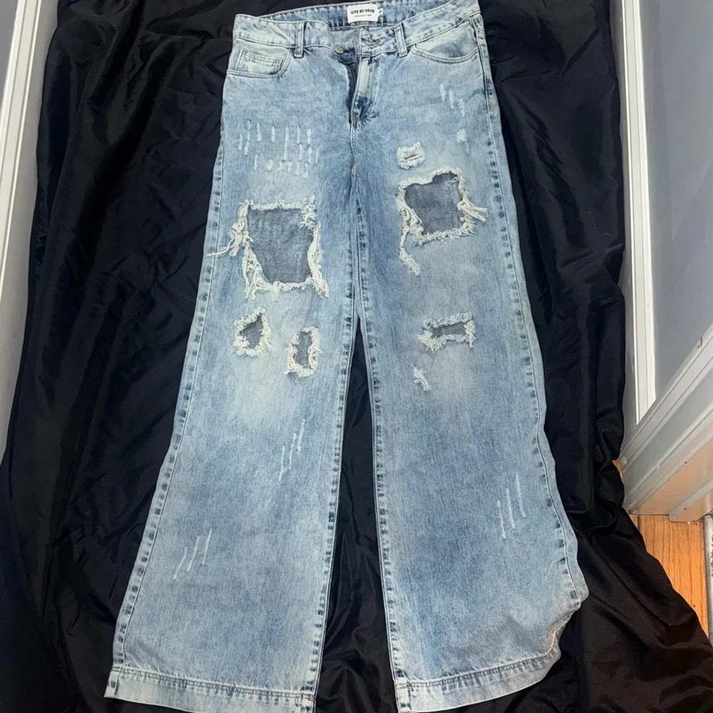 Distressed Light Blue Jeans - Picture 1 of 3